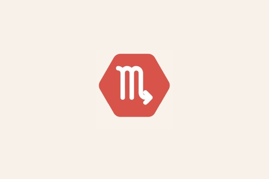 Ilustração do signo Escorpião, com símbolo branco em forma de "M" com seta na ponta final sobre fundo vermelho em hexágono