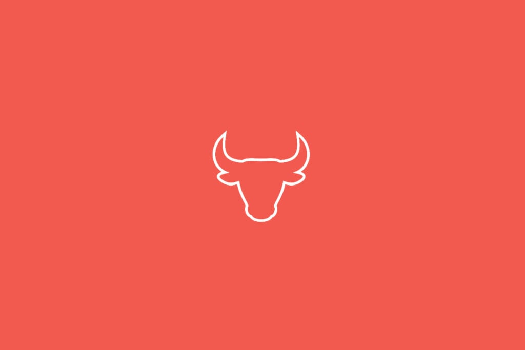 Ilustração do signo de Touro em fundo vermelho, com a cabeça de um touro de chifres curvados