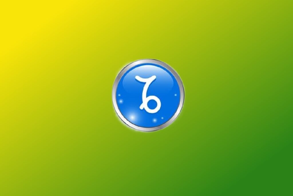 Ilustração do signo de Capricórnio com símbolo branco curvo dentro de um círculo azul com contorno prateado sobre fundo verde e amarelo