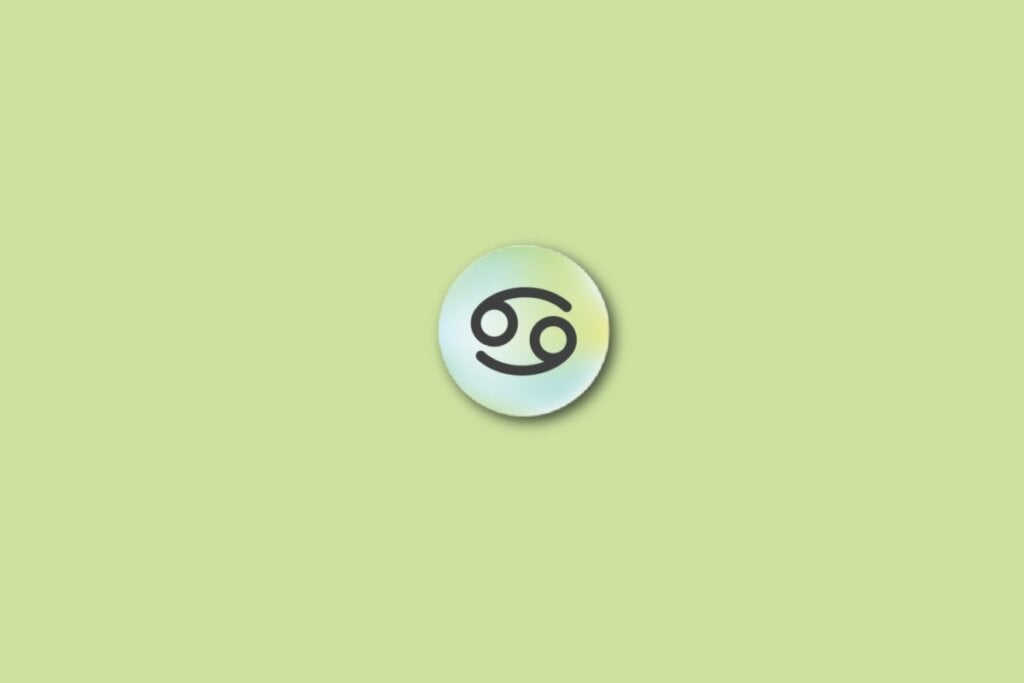 Ilustração do signo de câncer, em um círculo com as cores verde, azul e amarelo, sobre um fundo verde