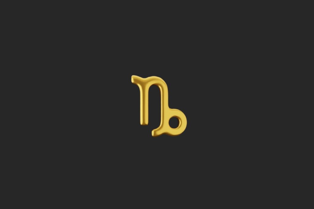 ilustração do símbolo do signo de capricórnio em dourado sobre fundo preto