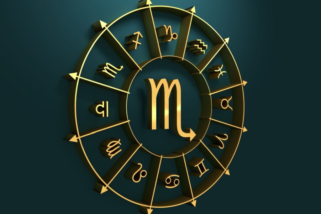 círculo em amarelo com símbolo dos 12 signos em volta, separados por flechas, com símbolo do signo de escorpião no centro, sobre fundo verde-escuro