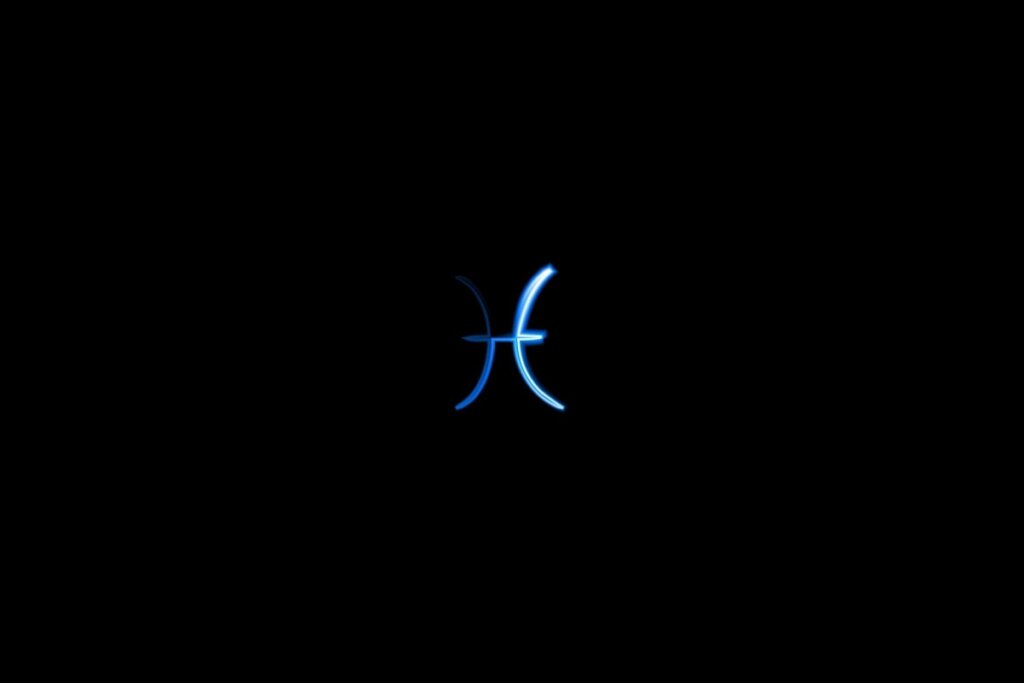 Ilustração do signo de peixes em azul sobre um fundo preto