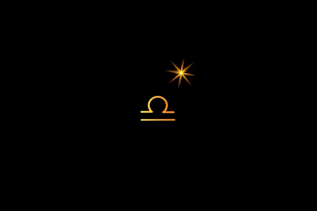 Ilustração do signo de libra, em um fundo preto, com uma estrela do lado direito superior