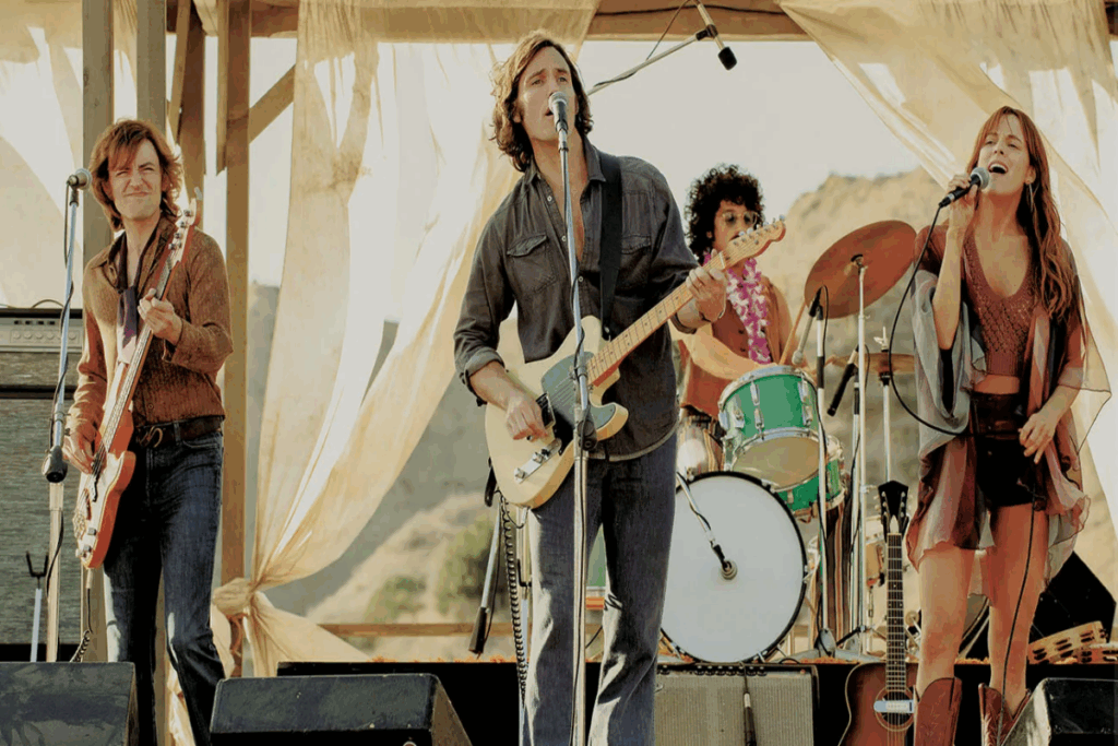 4 pessoas tocando em show de música usando roupas de época 