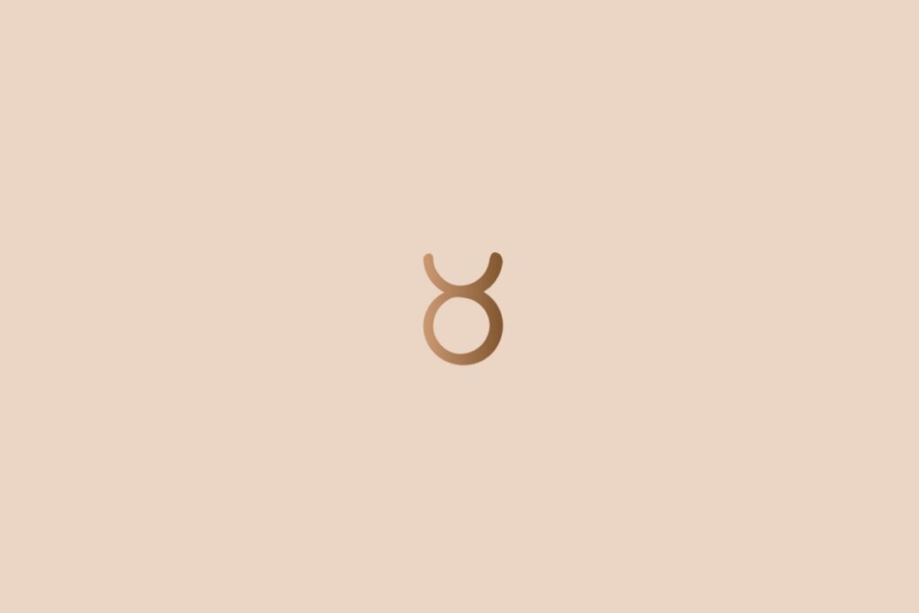 Ilustração do signo de touro na cor marrom em um fundo rosa-claro