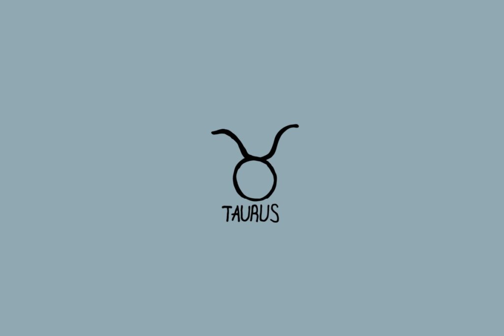 Ilustração do signo de touro em preto em um fundo cinza com o nome do signo embaixo