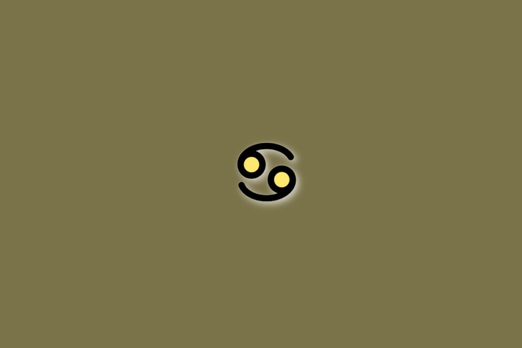 Símbolo do signo de câncer em preto, com parte amarela dentro, sobre fundo verde-oliva