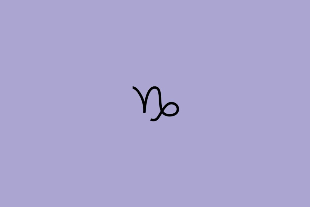 Ilustração do signo de capricórnio em preto em um fundo roxo