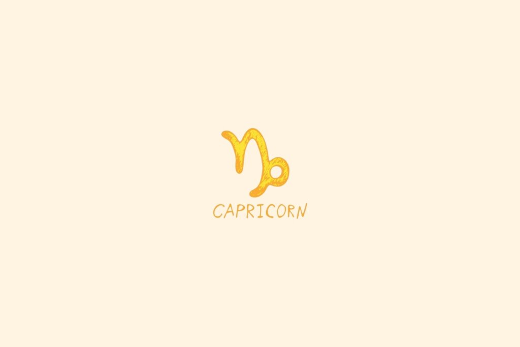 símbolo do signo de Capricórnio em dourado sobre fundo bege claro, com o nome “CAPRICORN” abaixo