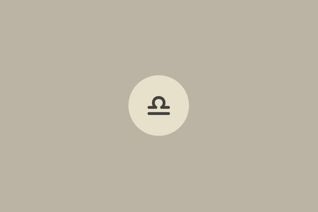 Imagem minimalista com fundo bege claro e o símbolo do signo de libra centralizado dentro de um círculo em tom mais claro