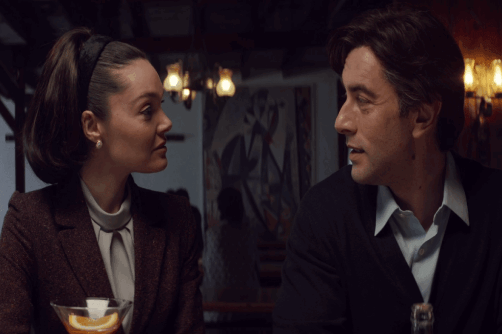 Mulher e homem frente a frente conversando