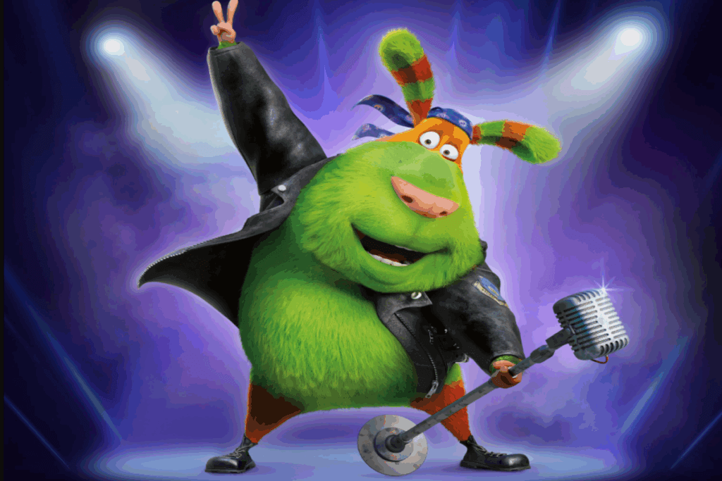Personagem animado e peludo vestindo jaqueta de couro, segurando um microfone e fazendo pose de rock em um palco iluminado