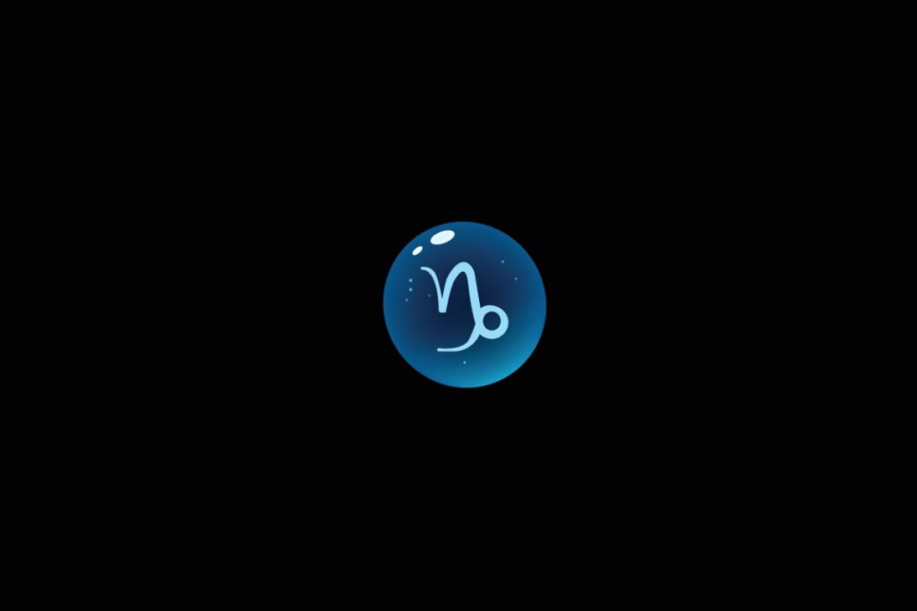 Ilustração do signo de capricórnio dentro de uma bolha azul sobre um fundo preto