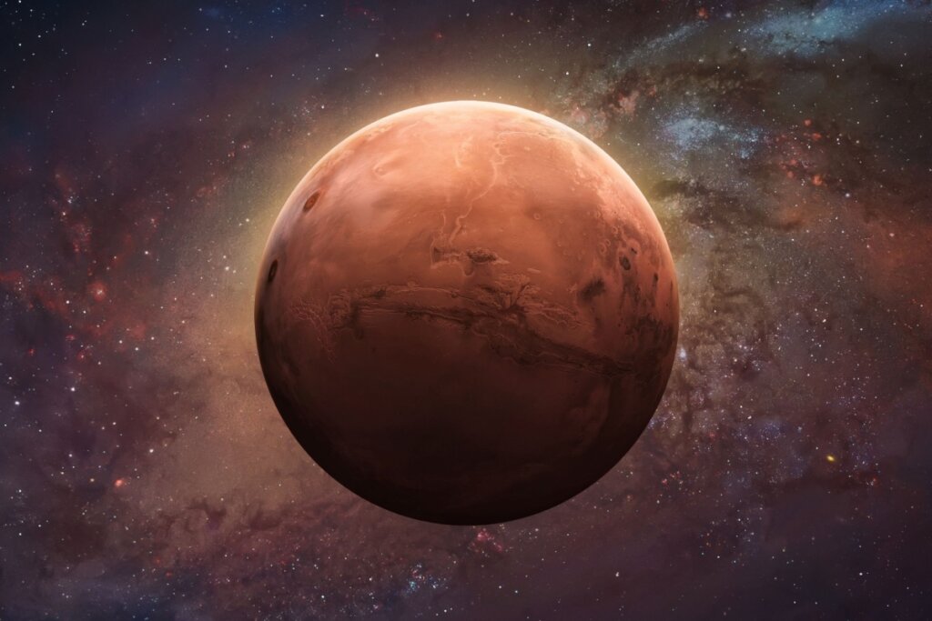 Imagem do planeta Marte vermelho com galáxias ao fundo
