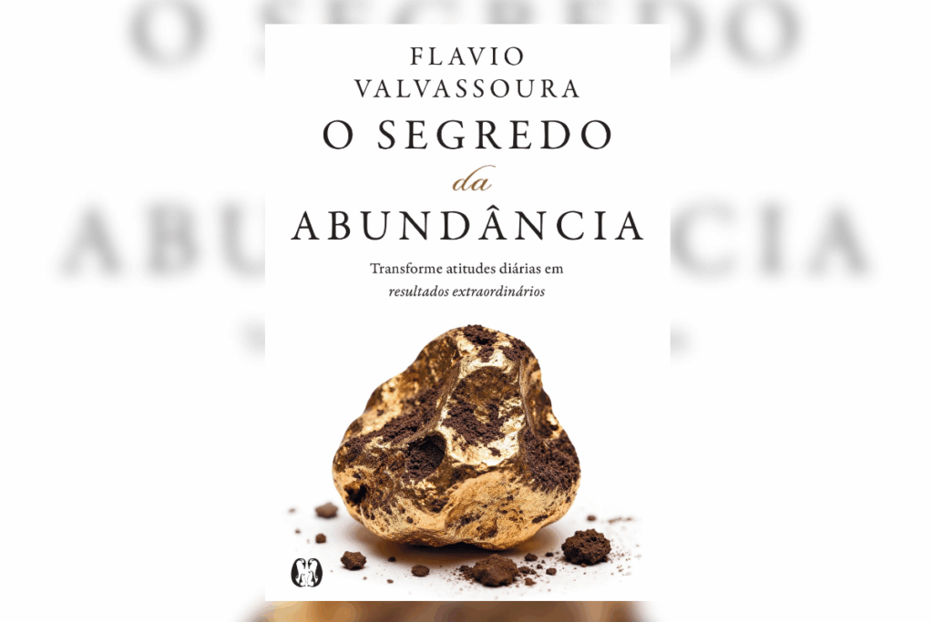 Capa do livro "O Segredo da Abundância: Transforme atitudes diárias em resultados extraordinários", de Flavio Valvassoura. A capa possui fundo branco e traz no centro a imagem de uma pepita de ouro coberta com fragmentos de terra escura.
