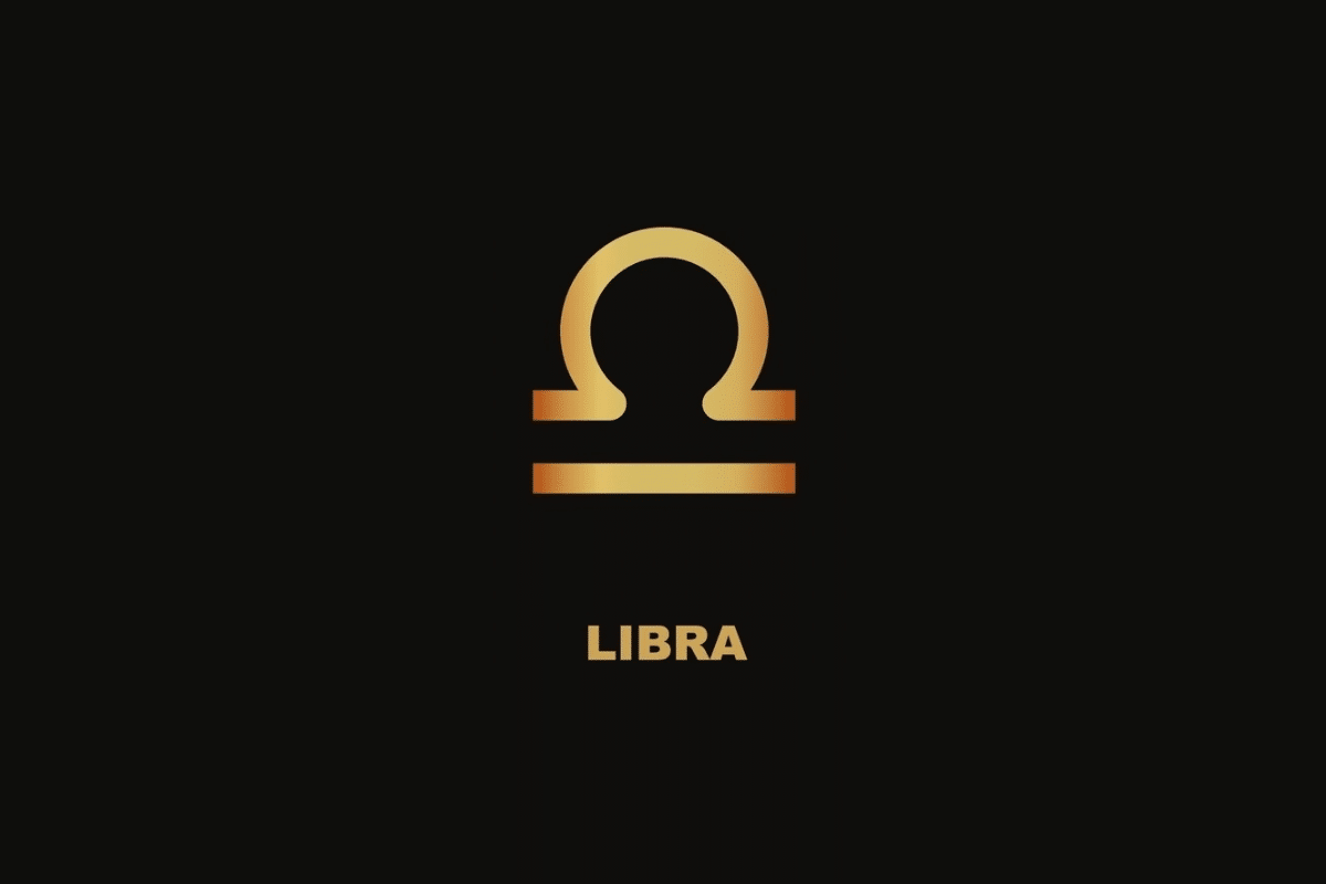 Símbolo dourado do signo de Libra sobre fundo preto, com o nome "LIBRA" escrito abaixo.