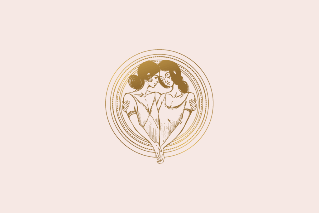 Ilustração do signo Gêmeos: gravura dourada de duas mulheres abraçadas, com as cabeças encostadas e as mãos dadas embaixo, dentro de um medalhão de anéis dourados finos e pontilhados; em fundo rosa-claro.