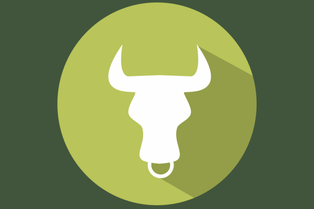 a imagem representa o signo de Touro com a silhueta branca da cabeça de um touro visto de frente. Os grandes chifres se destacam sobre um círculo verde-amarelado, com uma sombra projetada ao fundo.